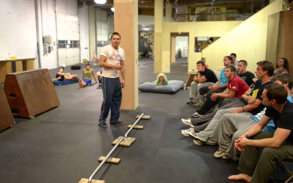Ryan Ford teaches a parkour class at APEX Movement. Ford recently co-authored a book on strength training with parkour.