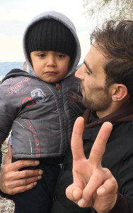 A refugee with his son. 