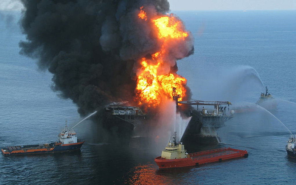 Platform supply vessels battle the blazing remnants of the off shore oil rig Deepwater Horizon.