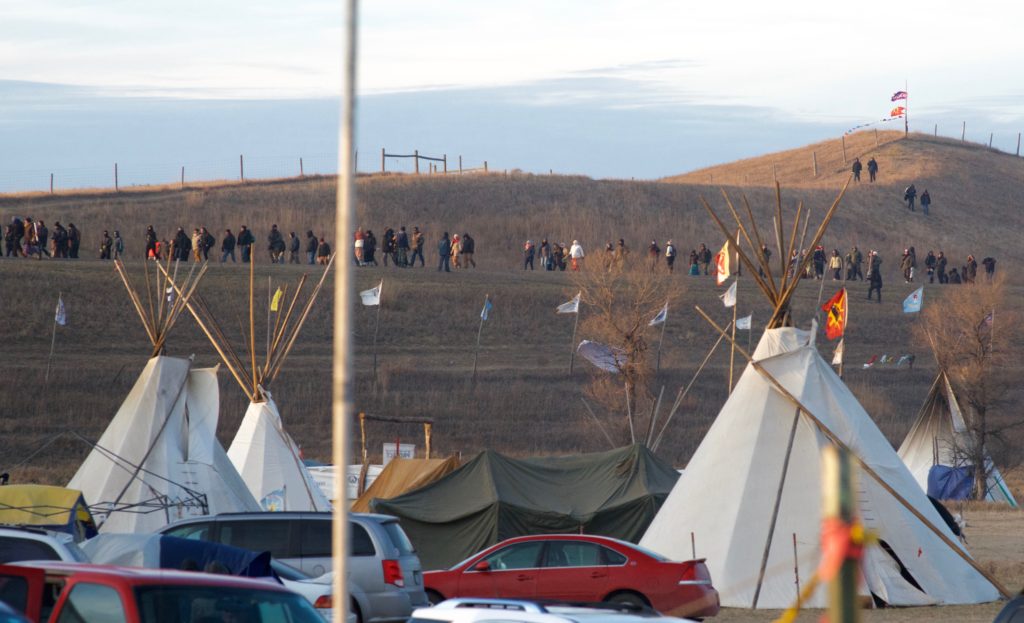 Protesters return to camp following an action to show support for Redfawn Fallis, a fellow Water Protector being held on attempted murder charges accused of firing three shots at law enforcement during a confrontation in October. Protesters claim there was no gun and Redfawn is a political prisoner. 
