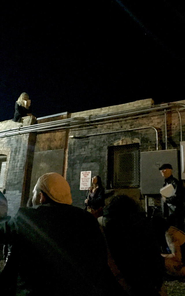 A poem, performed from the rooftop in Morrisson Alley. 